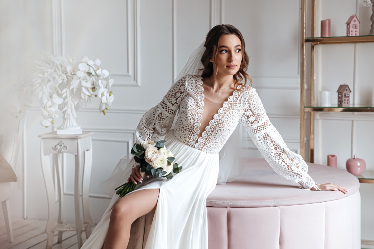 attractive-young-bride-beautiful-boho-wedding-dress-posing-with-bouquet-bright-room (1)